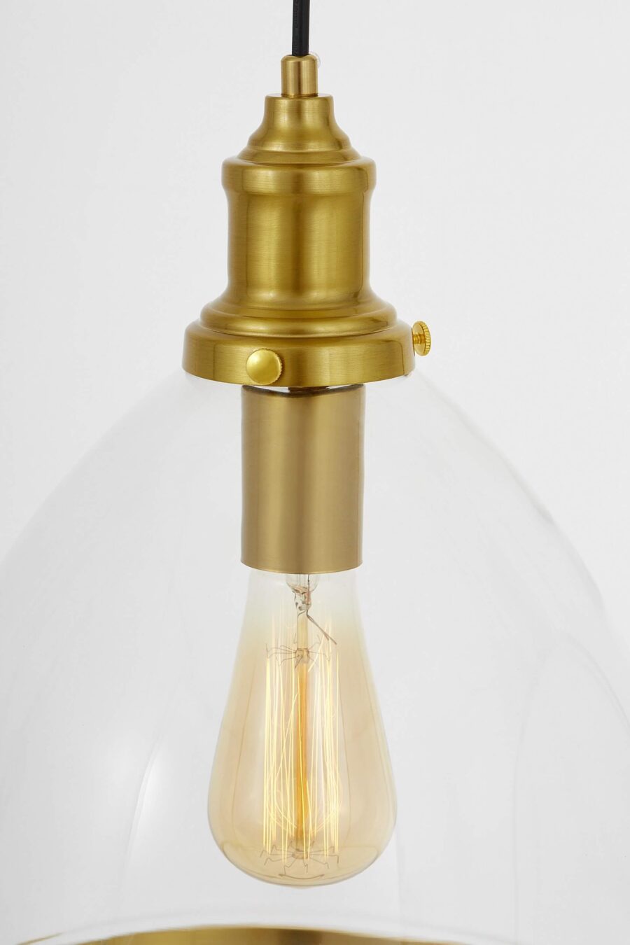 Lampada moderna a sospensione in vetro trasparente bordo ottone DOLOMIA